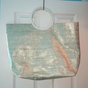gold travel bag or beach bag